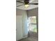 Well-lit bedroom with ceiling fan and window at 8250 N Grand Canyon Dr # 2029, Las Vegas, NV 89166