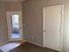 Bedroom boasts balcony access and a large closet at 8250 N Grand Canyon Dr # 2029, Las Vegas, NV 89166