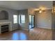 Living room features wood flooring, fireplace and backyard access at 8250 N Grand Canyon Dr # 2029, Las Vegas, NV 89166