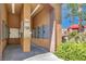 Mailboxes secured in a small alcove; view of some landscaping outside at 8250 N Grand Canyon Dr # 2029, Las Vegas, NV 89166