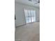 This bedroom has a ceiling fan and window with shutter at 8777 Beckett Ridge Ave, Las Vegas, NV 89149