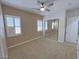 Inviting bedroom with ample natural light from shuttered windows, plus mirrored closet doors at 8777 Beckett Ridge Ave, Las Vegas, NV 89149