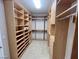 Large walk-in closet with custom shelving and drawers, providing plenty of storage at 8777 Beckett Ridge Ave, Las Vegas, NV 89149