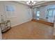 Elegant dining area featuring a chandelier and views to additional living spaces at 8777 Beckett Ridge Ave, Las Vegas, NV 89149