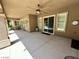 Spacious covered back patio with ceiling fan at 8777 Beckett Ridge Ave, Las Vegas, NV 89149