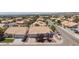 Aerial view of neighborhood featuring desert landscaping and tile roofs at 9091 W Viking Rd, Las Vegas, NV 89147