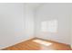 Cozy bedroom with light-colored wood floor and a window with white blinds at 9091 W Viking Rd, Las Vegas, NV 89147