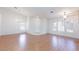 Inviting living room filled with natural light and featuring hardwood floors at 9091 W Viking Rd, Las Vegas, NV 89147