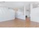 Bright and airy living room featuring hardwood floors and neutral paint at 9091 W Viking Rd, Las Vegas, NV 89147