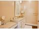 Bathroom vanity featuring marble counters, double sink, and built-in makeup counter at 9500 Balatta Canyon Ct, Las Vegas, NV 89144