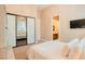 Bright bedroom with a comfortable bed and a large mirrored closet at 9500 Balatta Canyon Ct, Las Vegas, NV 89144