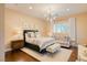 Bright, spacious bedroom with hardwood floors, sitting area, and lots of natural light at 9500 Balatta Canyon Ct, Las Vegas, NV 89144