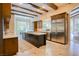 This spacious kitchen boasts a large island, stainless appliances, and lots of natural light at 9500 Balatta Canyon Ct, Las Vegas, NV 89144