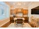 A spacious office with a large desk, wood cabinets, and a large window at 9500 Balatta Canyon Ct, Las Vegas, NV 89144