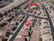 Aerial view of a neighborhood with access to a community pool with mountain views at 1094 Paradise Resort Dr, Henderson, NV 89002