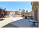 Backyard patio has low-maintenance desert landscaping, an outdoor dining area, and a built-in grill at 1094 Paradise Resort Dr, Henderson, NV 89002