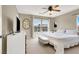 Bright bedroom with large windows, bed, and dresser, creating a relaxing and comfortable atmosphere at 1094 Paradise Resort Dr, Henderson, NV 89002