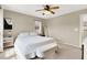 Well-lit bedroom with bed and bench, providing a comfortable and stylish retreat at 1094 Paradise Resort Dr, Henderson, NV 89002