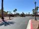 A secure entrance with palm trees provides peace of mind to the residents at 1094 Paradise Resort Dr, Henderson, NV 89002