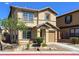 Charming two-story home boasting a well-manicured front yard and an attached one car garage at 1094 Paradise Resort Dr, Henderson, NV 89002