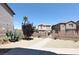 Well-maintained front yard features desert landscaping, a gated entrance, and a walkway to the house at 1094 Paradise Resort Dr, Henderson, NV 89002