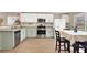 Spacious kitchen featuring stainless steel appliances, lots of counter space, and a dining area at 1094 Paradise Resort Dr, Henderson, NV 89002