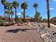 Beautifully landscaped pool area with lush plants and mature trees providing a tranquil and inviting space at 1094 Paradise Resort Dr, Henderson, NV 89002
