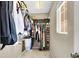 Organized walk-in closet with clothing racks, shelving, and window, maximizing storage at 1094 Paradise Resort Dr, Henderson, NV 89002