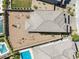 Expansive backyard featuring desert landscaping with outdoor seating areas and a pristine swimming pool at 12429 Alpenglow Ct, Las Vegas, NV 89138