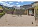 Spacious backyard featuring low-maintenance gravel, tasteful landscaping, and mountain views at 12429 Alpenglow Ct, Las Vegas, NV 89138