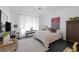 Comfortable bedroom with patterned rug and decorative accents at 12429 Alpenglow Ct, Las Vegas, NV 89138