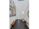 Grand entryway with high ceilings, tiled floors, and staircase at 12429 Alpenglow Ct, Las Vegas, NV 89138