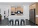 Modern kitchen with a large island, stainless steel appliances, and ample counter space, ideal for cooking and entertaining at 12429 Alpenglow Ct, Las Vegas, NV 89138