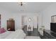 Bedroom leading to a bright, modern bath with soaker tub and walk-in shower at 12429 Alpenglow Ct, Las Vegas, NV 89138