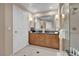 The bathroom has a double sink vanity with granite countertops, a shower, and a separate soaking tub at 125 E Harmon Ave # 2907, Las Vegas, NV 89109