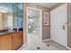 This bathroom features a soaking tub, a separate glass-enclosed shower, and luxurious fixtures for a spa-like experience at 125 E Harmon Ave # 2907, Las Vegas, NV 89109