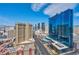 The image shows the city with several hotels and casinos and busy streets below at 125 E Harmon Ave # 2907, Las Vegas, NV 89109