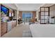 Comfortable condo suite featuring a kitchenette, seating area, and city views at 125 E Harmon Ave # 2907, Las Vegas, NV 89109