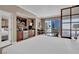 Comfortable condo suite featuring a kitchenette, seating area, and city views at 125 E Harmon Ave # 2907, Las Vegas, NV 89109