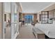 Comfortable condo suite featuring a kitchenette, seating area, and city views at 125 E Harmon Ave # 2907, Las Vegas, NV 89109