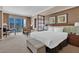 Well-appointed bedroom suite featuring city views, a king bed, and stylish furnishings at 125 E Harmon Ave # 2907, Las Vegas, NV 89109