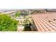 Aerial view of the community showing landscaped common areas and attractive tile roofs at 160 Lomita Heights Dr, Las Vegas, NV 89138