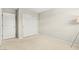 Bedroom featuring neutral colored walls and carpets with a closet and standard door at 160 Lomita Heights Dr, Las Vegas, NV 89138