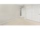 Bedroom featuring neutral carpets, walls and a closet with sliding doors at 160 Lomita Heights Dr, Las Vegas, NV 89138