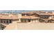 Stacked townhomes showing exteriors, tile roofs, and desert-friendly landscaping at 160 Lomita Heights Dr, Las Vegas, NV 89138