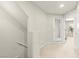 Upstairs hallway with door leading to private balcony and access to other rooms at 160 Lomita Heights Dr, Las Vegas, NV 89138