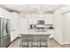 Well-equipped kitchen featuring granite countertops, stainless steel appliances, an island with seating and modern lighting at 160 Lomita Heights Dr, Las Vegas, NV 89138