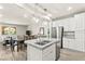 Modern kitchen with granite counters, stainless steel appliances, island and ample cabinet space at 160 Lomita Heights Dr, Las Vegas, NV 89138