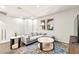 Cozy living room featuring a comfortable sectional sofa and stylish decor at 160 Lomita Heights Dr, Las Vegas, NV 89138