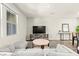 Comfortable living room with stylish furnishings, a large TV, and ample seating at 160 Lomita Heights Dr, Las Vegas, NV 89138